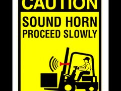 Sign caution sound horn proceed slowly